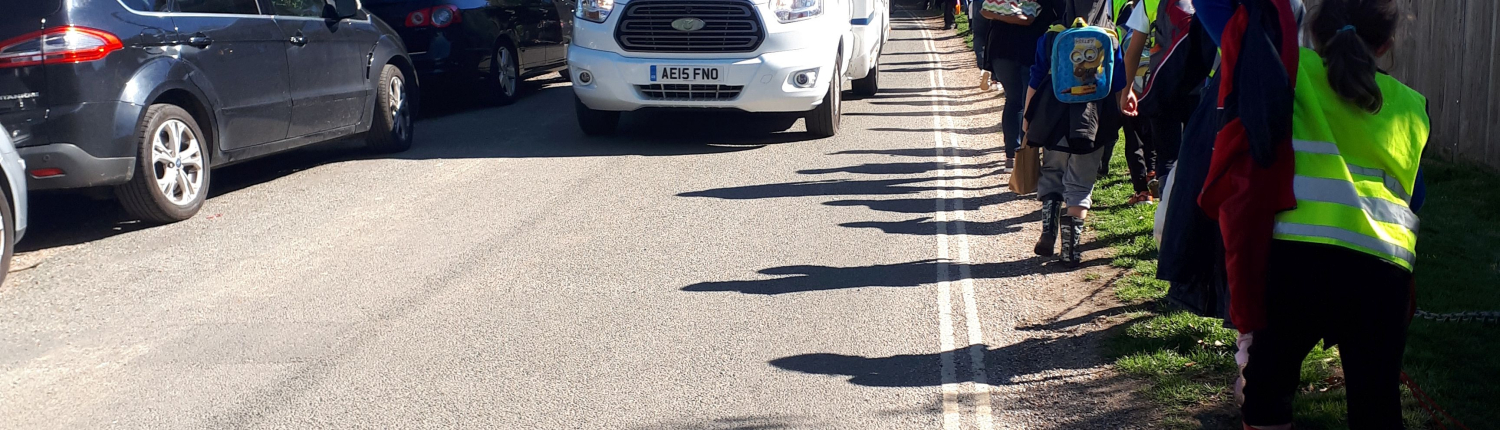 Children wallking down Dell Quay Road camper van
