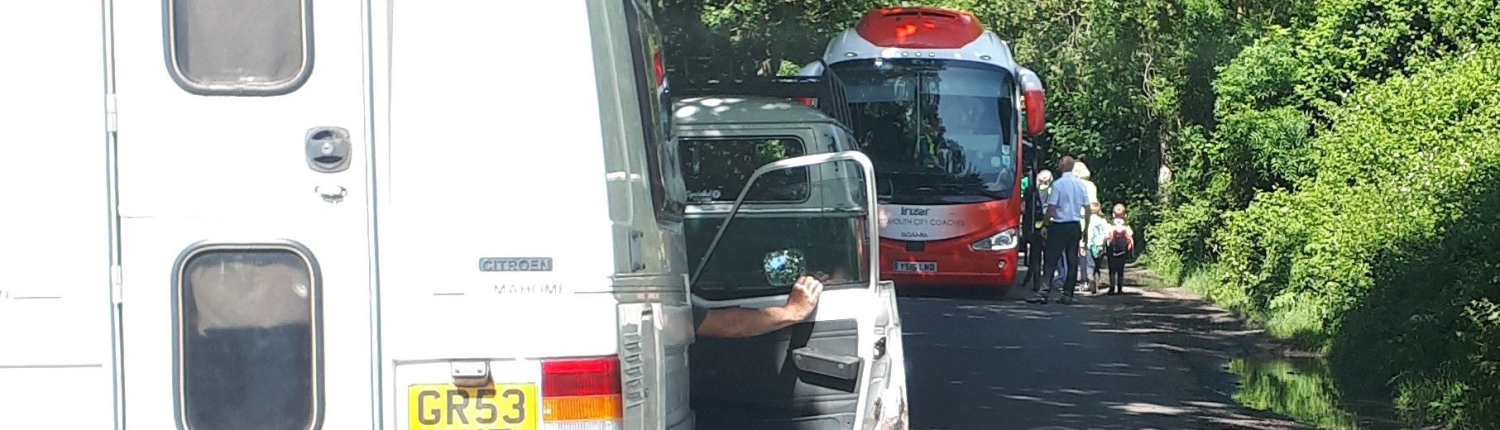 coach dropping off children on dell quay road